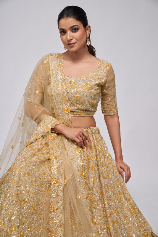 Golden Coloured with a Leaves Pattern Embellished with Golden Sequins, Stones & Cut Dana work Women Ethnic Party wear Lehenga Choli with Dupatta!!