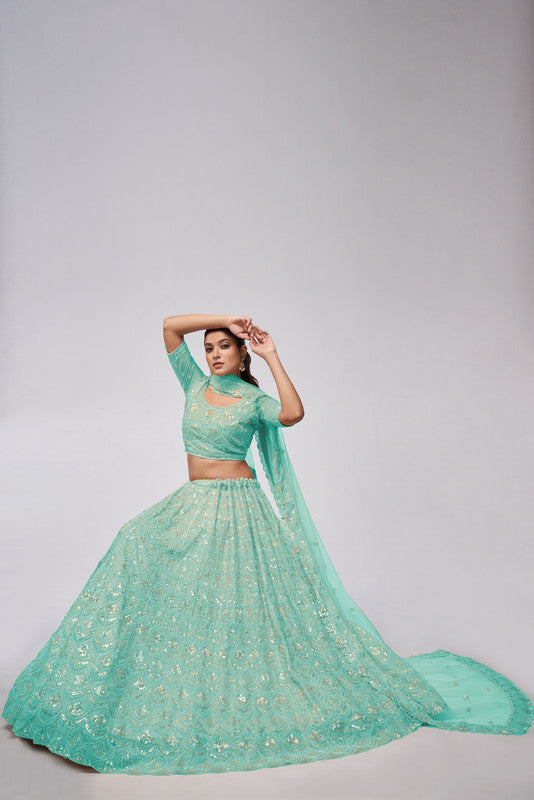 Sky Blue Coloured with a Leaves Pattern Embellished with Golden Sequins, Stones & Cut Dana work Women Ethnic Party wear Lehenga Choli with Dupatta!!