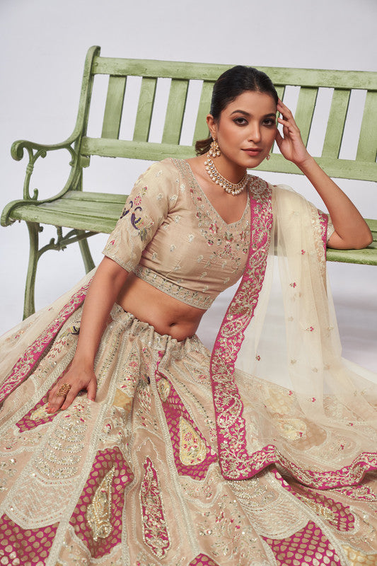 Ivory Coloured with Motifs & Embroidered Silk Patches all over the Skirt and hand work Women Ethnic Party wear Lehenga Choli with Dupatta!!