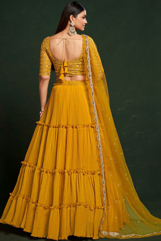 Yellow Embroidered Crepe Lehenga Choli | Bridal lehenga online, Designer  lehenga choli, Lehenga choli