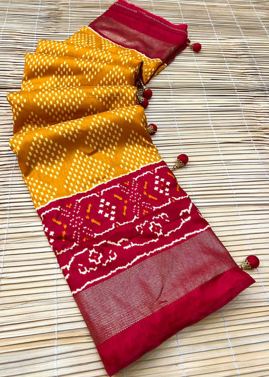 Maroon & Yellow Coloured Soft Dolla Silk Patola Design with Heavy Foil Print & Fancy Tussels Women Party wear Saree with Blouse!!