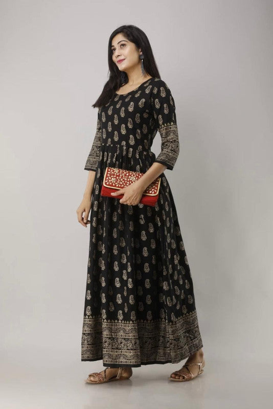 HEAVY REYON WITH HEAVY GOLD PRINT GOWN