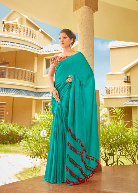 Rama Green Coloured Jute Linen Cotton Saree with Pompom Border!!