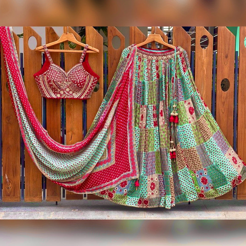 Zartari - Zartari's bridal lehenga. This marvellous piece has a full doli  theme with bride sitting in a doli and elephants and horses are the part of  the fleet .The intricacy of